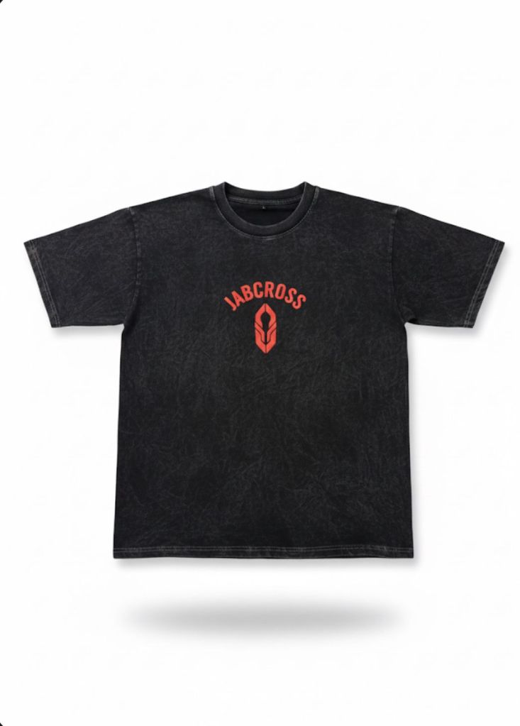 Black acid wash JABCROSS tee with red arched logo and emblem on front, circular "Main Event Fighters" print on back.